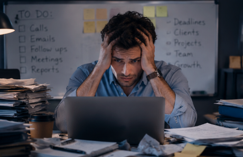 Before: a stressed professional with his head in his hands at a cluttered desk, a to-do list of calls, emails, follow-ups, meetings and reports behind him